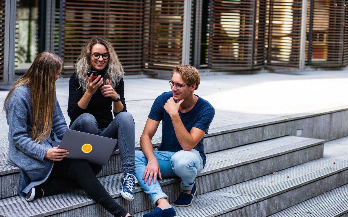 Three people in a meeting